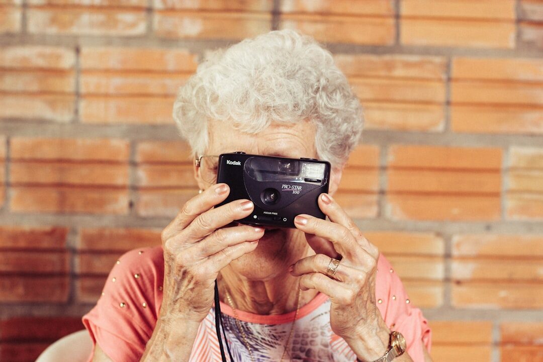 Older adults learning technology on tablets in a classroom