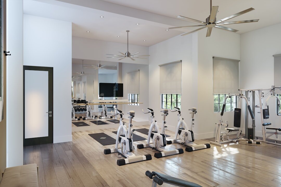 Bright modern community center activity room with large windows