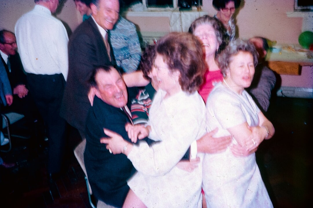 elderly people dancing happily