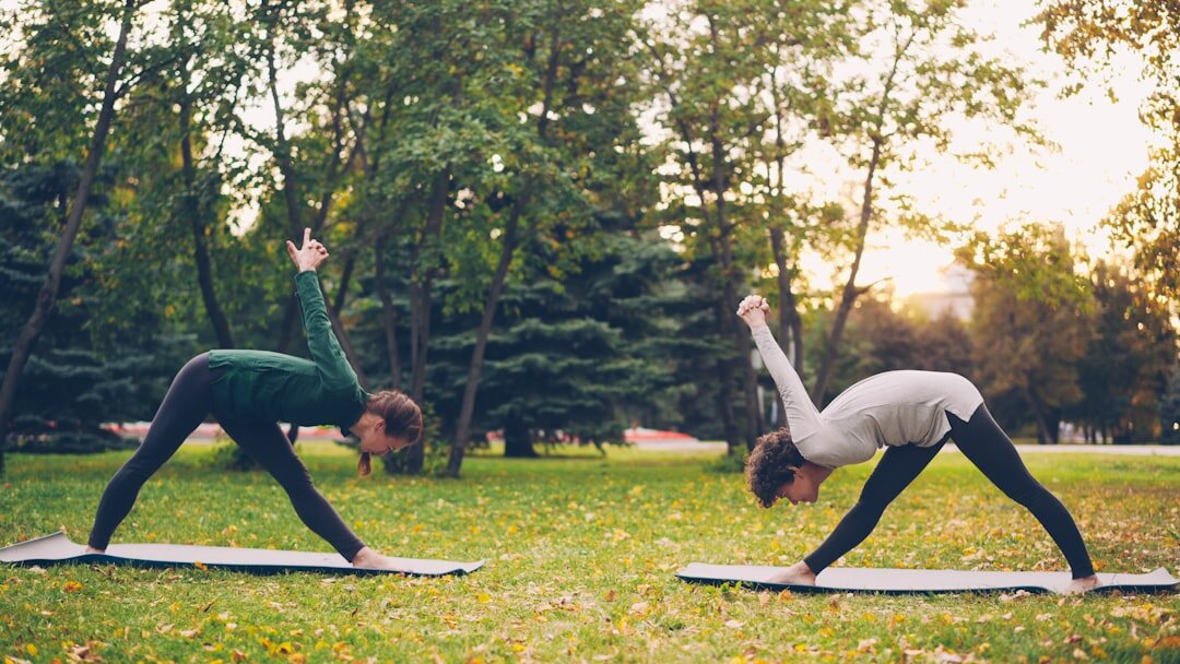 senior couple stretching outdoors