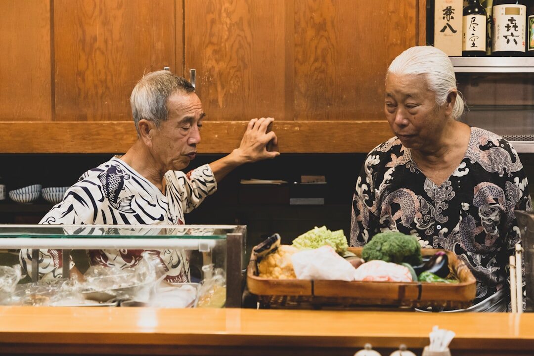 healthy elderly couple cooking